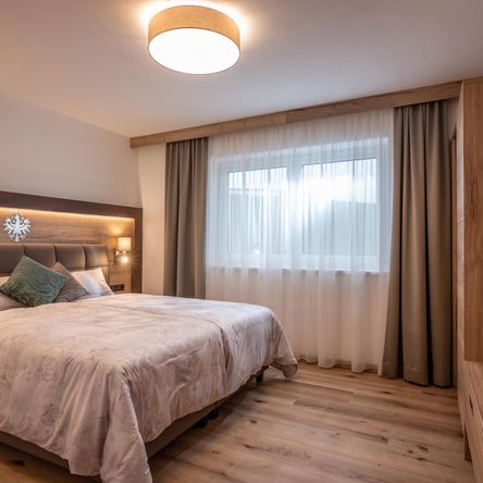Schlafzimmer im Apartment Penthouse am Wilden Kaiser